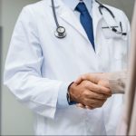 Doctor patient handshake